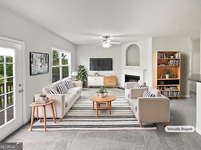 2438 Suwanee Pointe Dr, Lawrenceville, GA 30043 - living area with ceiling fan and a fireplace
