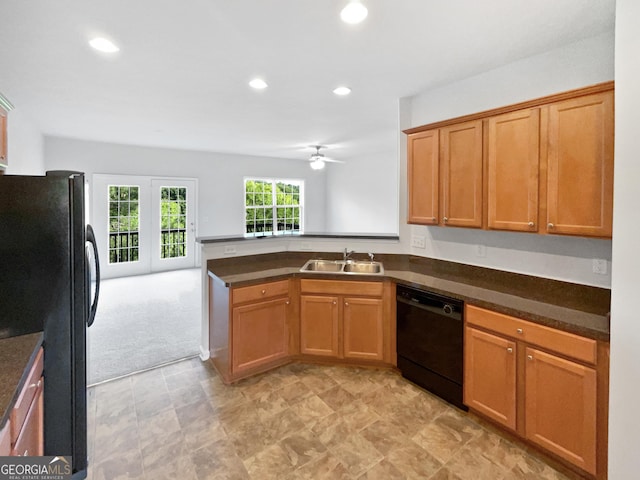 2438 Suwanee Pointe Dr, Lawrenceville, GA 30043 - kitchen with black appliances, dark countertops, ceiling fan, a peninsula, and recessed lighting