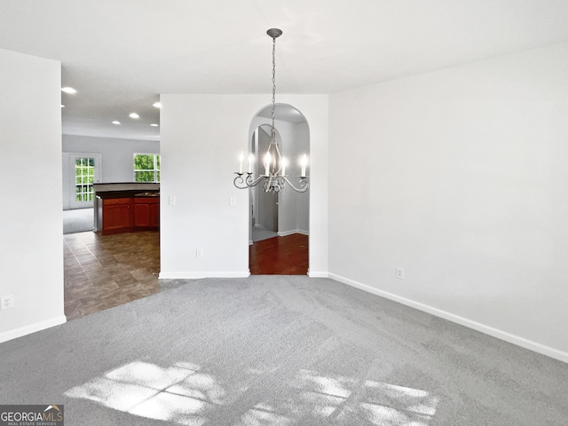 2438 Suwanee Pointe Dr, Lawrenceville, GA 30043 - carpeted spare room with a chandelier and recessed lighting