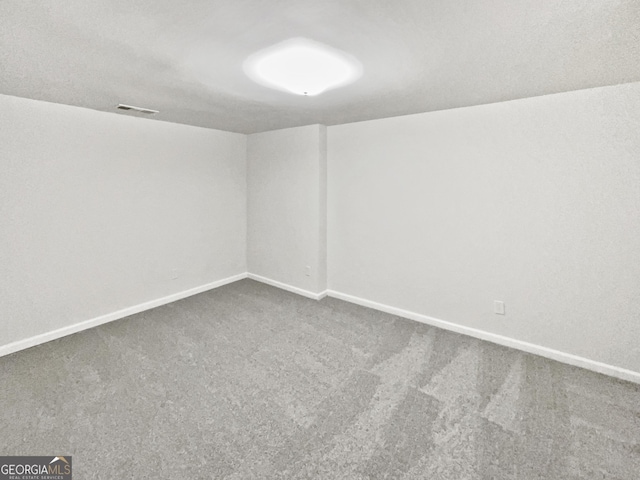 2438 Suwanee Pointe Dr, Lawrenceville, GA 30043 - unfurnished room featuring dark carpet and baseboards