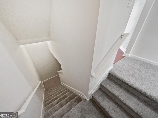 2438 Suwanee Pointe Dr, Lawrenceville, GA 30043 - staircase featuring carpet floors and baseboards