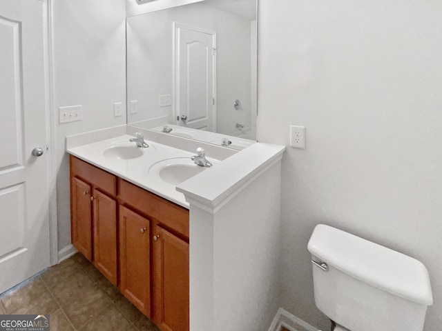 2438 Suwanee Pointe Dr, Lawrenceville, GA 30043 - bathroom with double vanity and tile patterned floors