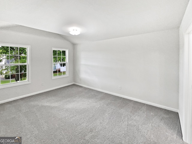 2438 Suwanee Pointe Dr, Lawrenceville, GA 30043 - unfurnished room with carpet flooring and lofted ceiling