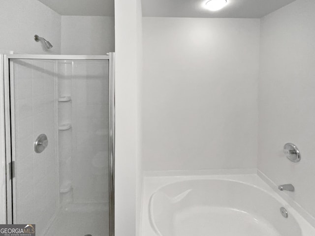 2438 Suwanee Pointe Dr, Lawrenceville, GA 30043 - full bathroom with a shower stall and a garden tub