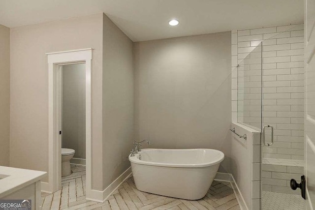 175 Pinecrest Ct, Athens, GA 30605 - full bathroom with a freestanding tub, a stall shower, recessed lighting, and vanity
