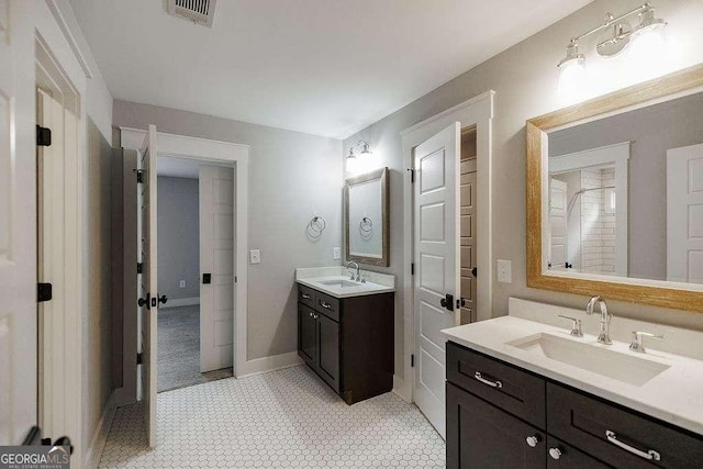 175 Pinecrest Ct, Athens, GA 30605 - bathroom with two vanities and baseboards