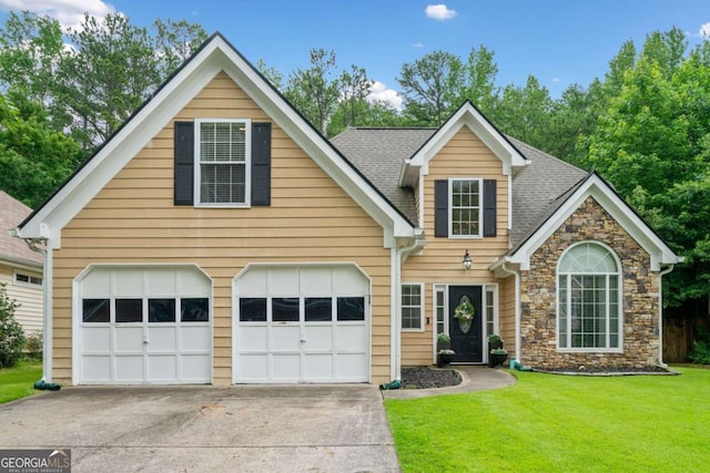 1825 Millstone Ct, Alpharetta, GA 30004 - traditional home featuring a front yard, a garage, driveway, stone siding, and roof with shingles