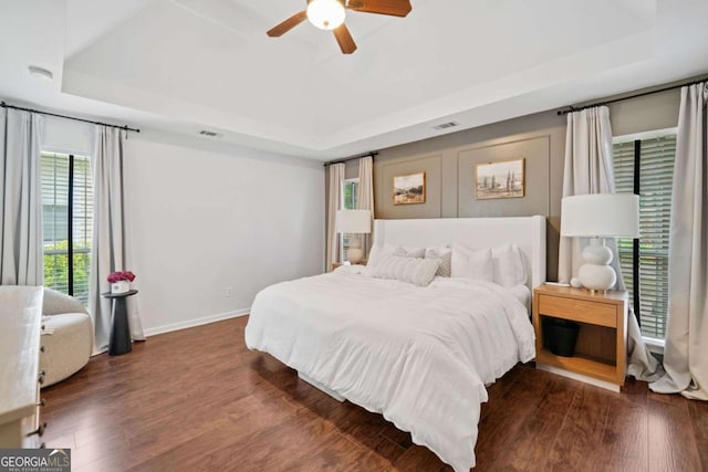 1825 Millstone Ct, Alpharetta, GA 30004 - bedroom with a raised ceiling, wood finished floors, and ceiling fan