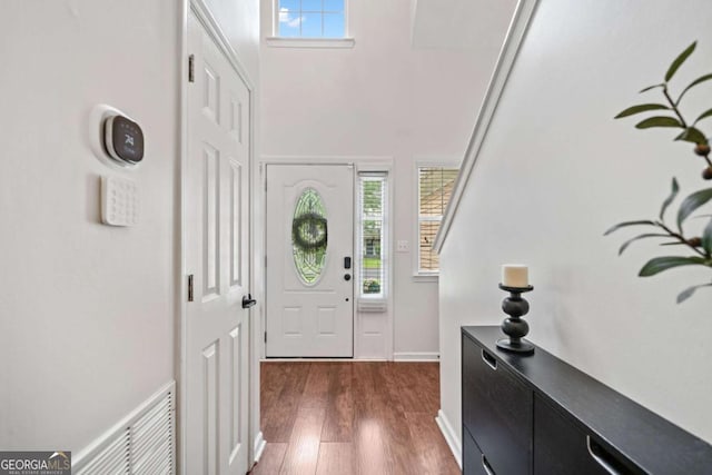 1825 Millstone Ct, Alpharetta, GA 30004 - entrance foyer featuring plenty of natural light and dark wood-type flooring