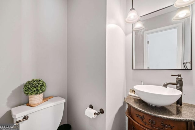 1825 Millstone Ct, Alpharetta, GA 30004 - half bathroom featuring toilet and vanity