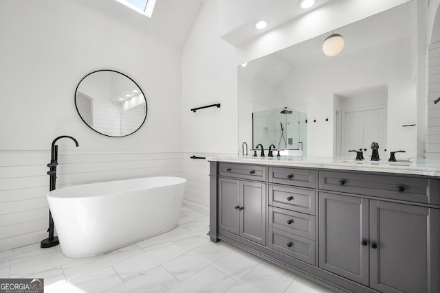100 Castlebrook Chase, Tyrone, GA 30290 - bathroom featuring a stall shower, marble finish flooring, double vanity, a skylight, and lofted ceiling