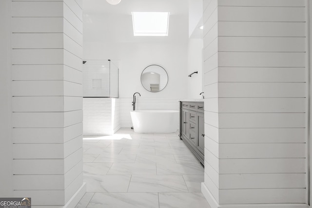 100 Castlebrook Chase, Tyrone, GA 30290 - full bathroom featuring a freestanding tub, vanity, marble look tile flooring, and a shower