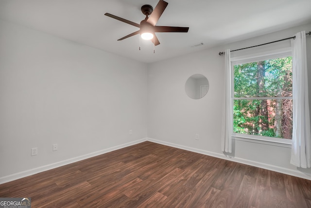 100 Castlebrook Chase, Tyrone, GA 30290 - empty room featuring dark wood-style flooring and a ceiling fan