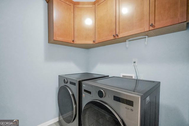 100 Castlebrook Chase, Tyrone, GA 30290 - laundry area featuring cabinet space and washer and dryer