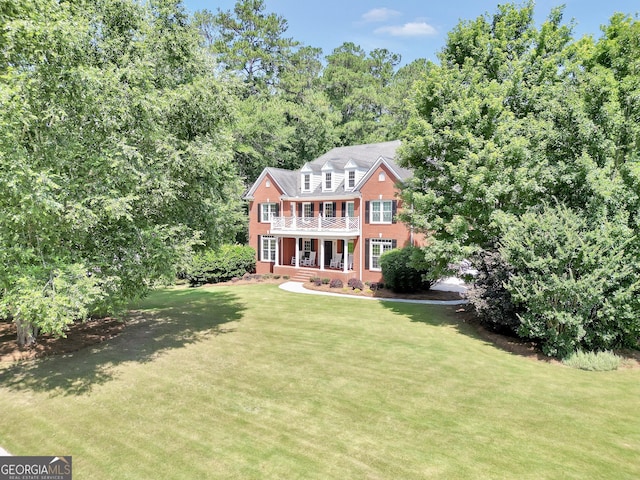 100 Castlebrook Chase, Tyrone, GA 30290 - view of front of property featuring a balcony, a front yard, and a porch