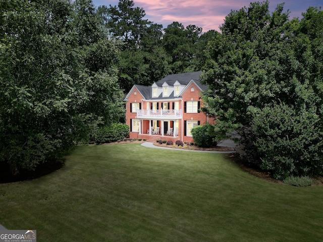 100 Castlebrook Chase, Tyrone, GA 30290 - colonial home featuring a balcony, brick siding, and a front yard