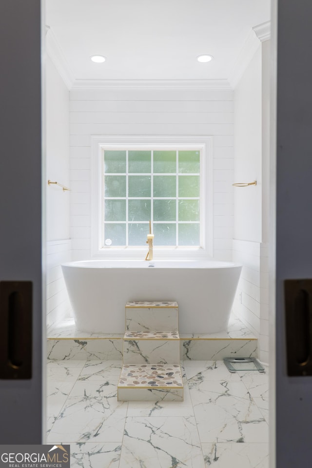 1112 Old Meadow Rd, Valdosta, GA 31605 - full bathroom featuring crown molding, a soaking tub, marble finish floors, and recessed lighting