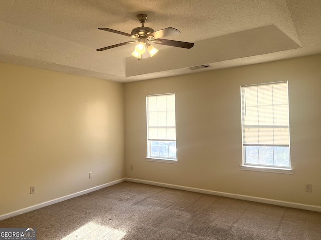 2561 Lancewood Ln, Lithonia, GA 30058 - unfurnished room featuring carpet flooring, ceiling fan, and a textured ceiling