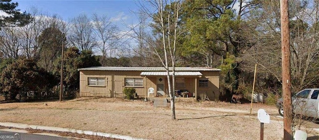 1677 Lake Louella Rd, Suwanee, GA 30024 - manufactured / mobile home featuring a metal roof