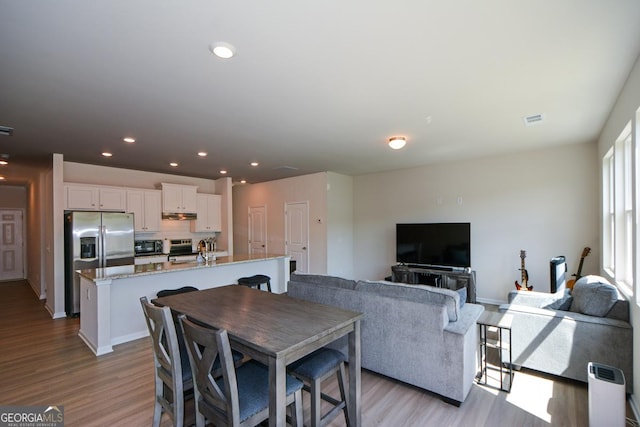 428 Whitetail Cir, Canton, GA 30115 - dining space with wood finished floors and recessed lighting