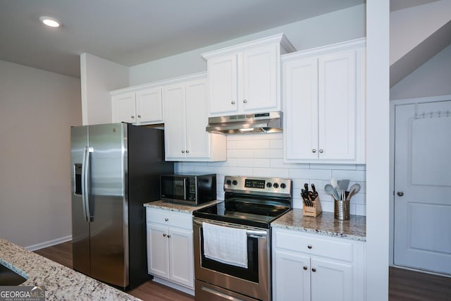 428 Whitetail Cir, Canton, GA 30115 - kitchen with appliances with stainless steel finishes, under cabinet range hood, dark wood-style flooring, light stone countertops, and recessed lighting