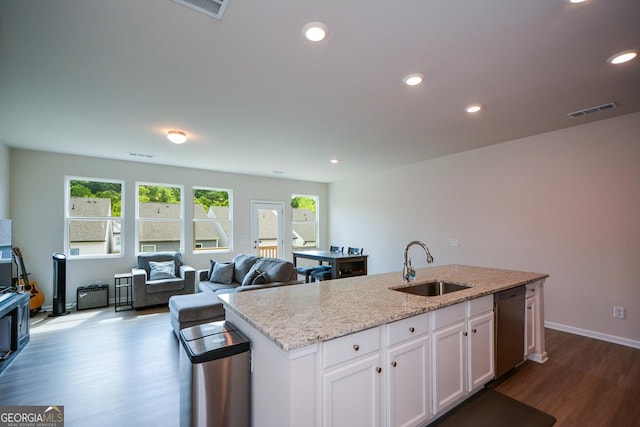 428 Whitetail Cir, Canton, GA 30115 - kitchen featuring dishwasher, dark wood-type flooring, healthy amount of natural light, a center island with sink, and recessed lighting