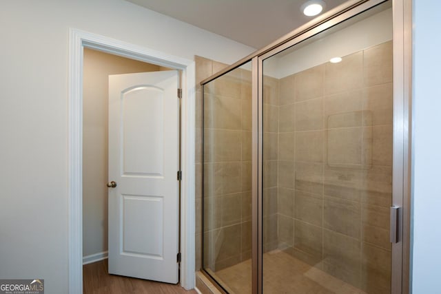 428 Whitetail Cir, Canton, GA 30115 - bathroom featuring a shower stall and wood finished floors