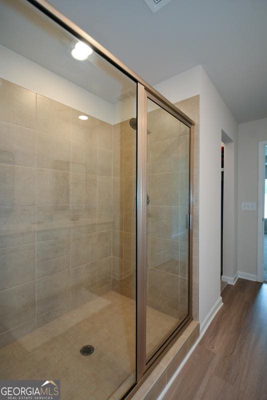 428 Whitetail Cir, Canton, GA 30115 - full bathroom with wood finished floors and a shower stall