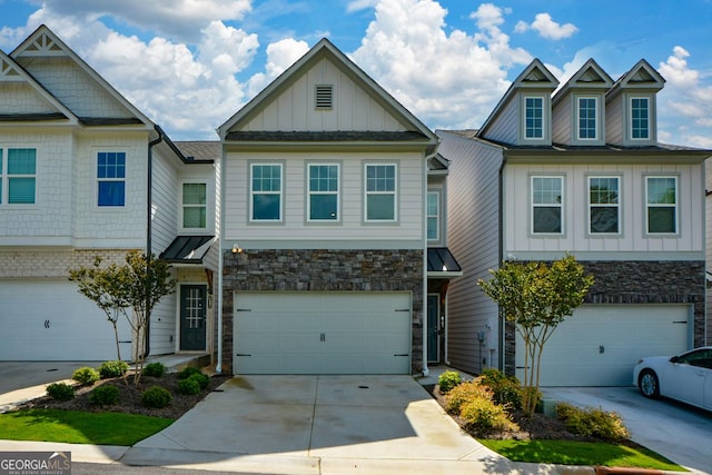 428 Whitetail Cir, Canton, GA 30115 - multi unit property featuring board and batten siding, stone siding, driveway, and a garage