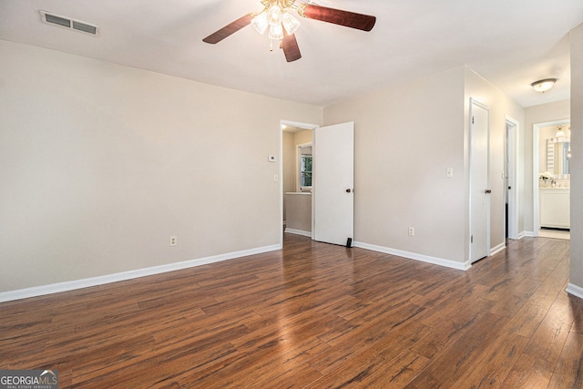5086 N Woodbridge Trl, Stone Mountain, GA 30088 - empty room featuring ceiling fan and dark wood-style flooring