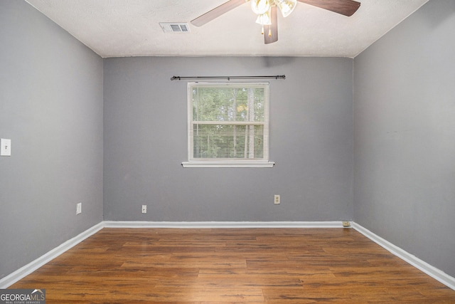 5086 N Woodbridge Trl, Stone Mountain, GA 30088 - spare room featuring ceiling fan and wood finished floors