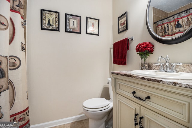 5086 N Woodbridge Trl, Stone Mountain, GA 30088 - bathroom featuring vanity and tile patterned flooring