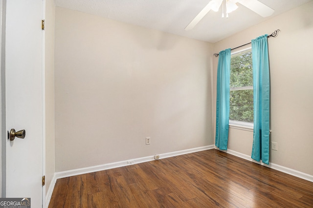 5086 N Woodbridge Trl, Stone Mountain, GA 30088 - unfurnished room with wood finished floors and a ceiling fan