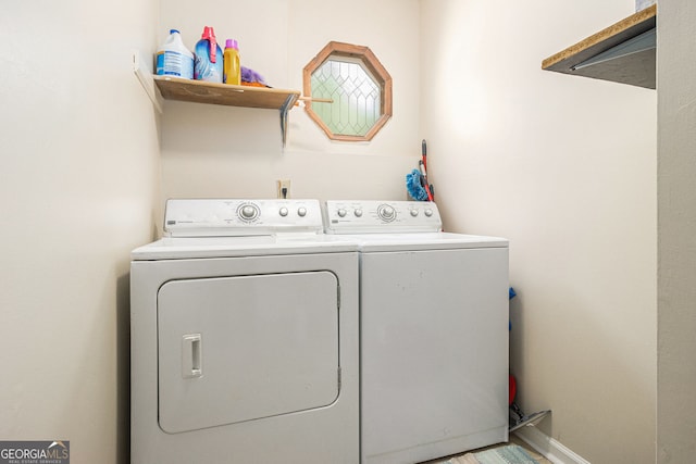 5086 N Woodbridge Trl, Stone Mountain, GA 30088 - washroom with washing machine and dryer and baseboards