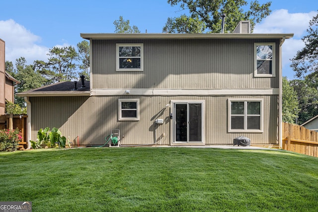 5086 N Woodbridge Trl, Stone Mountain, GA 30088 - rear view of house with a chimney