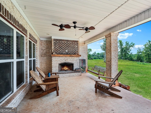 357 Old Driver Rd, Whitesburg, GA 30185 - view of patio with an outdoor brick fireplace and ceiling fan