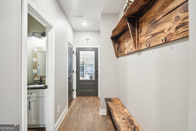 357 Old Driver Rd, Whitesburg, GA 30185 - mudroom with wood finished floors and recessed lighting
