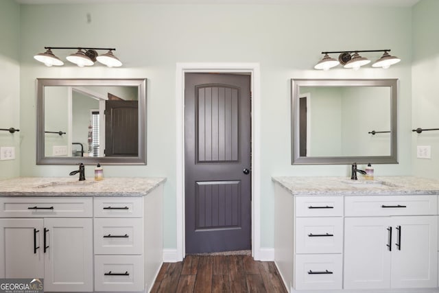 357 Old Driver Rd, Whitesburg, GA 30185 - bathroom with wood finished floors and two vanities