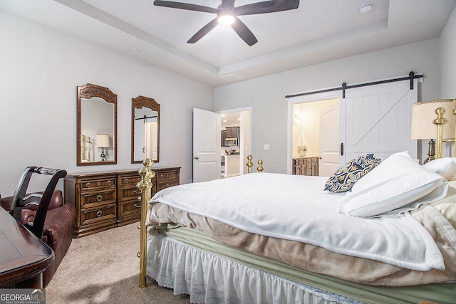 111 Point View Dr, Canton, GA 30114 - bedroom with carpet floors, a raised ceiling, a barn door, and a ceiling fan