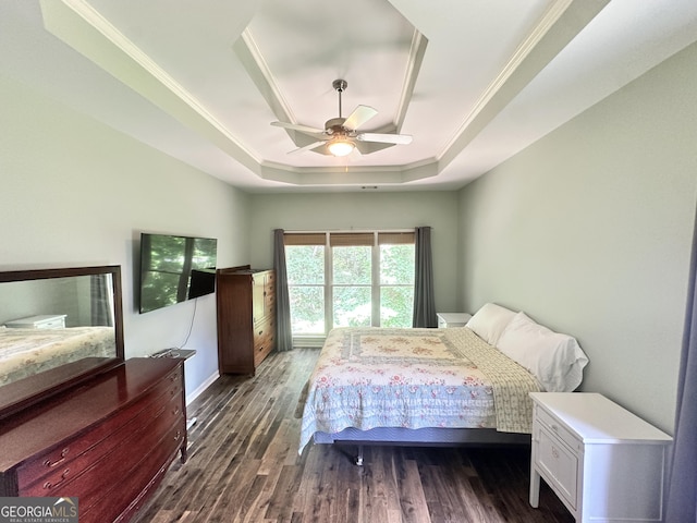 235 Pirkle Ct, Cumming, GA 30040 - bedroom with a tray ceiling, wood finished floors, ceiling fan, and crown molding