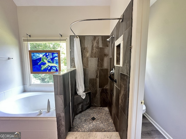 235 Pirkle Ct, Cumming, GA 30040 - bathroom with a tile shower and a bath