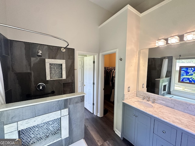 235 Pirkle Ct, Cumming, GA 30040 - full bath featuring a walk in shower, vanity, wood finished floors, and a walk in closet