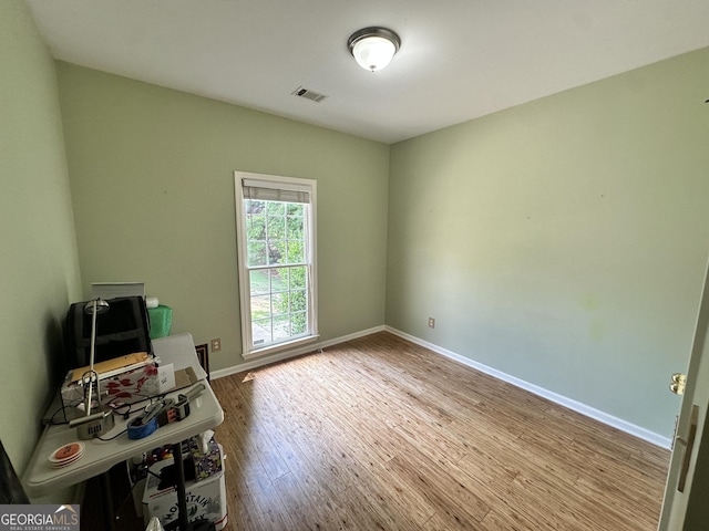 235 Pirkle Ct, Cumming, GA 30040 - unfurnished office featuring wood finished floors and baseboards