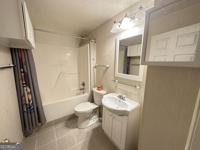 235 Pirkle Ct, Cumming, GA 30040 - full bath with shower / bathtub combination, vanity, tile patterned flooring, a textured ceiling, and decorative backsplash