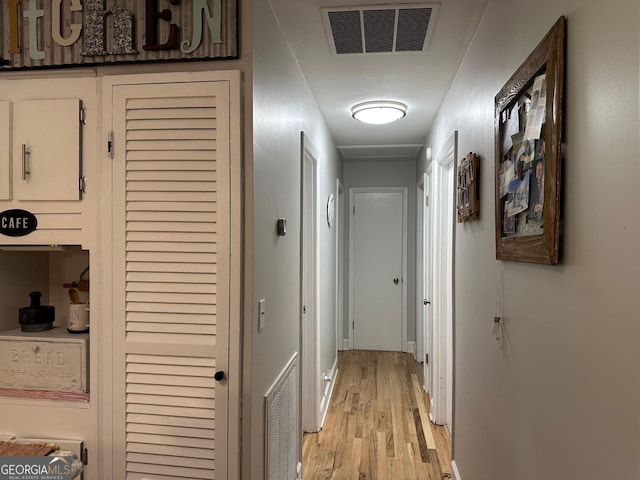 1408 Main St, Perry, GA 31069 - corridor featuring light wood finished floors and baseboards