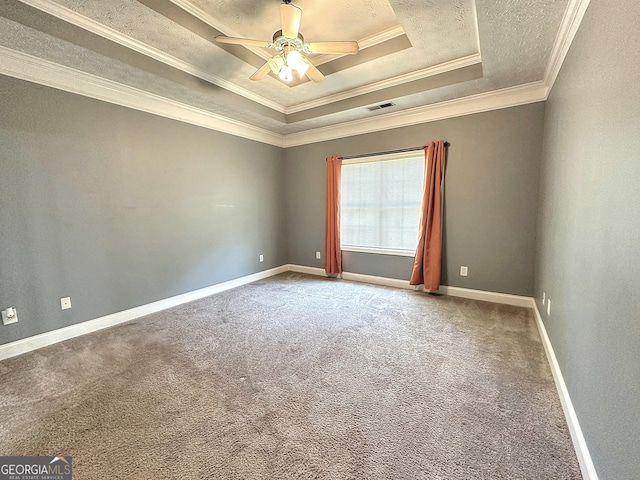 101 Riverchest Dr, Lagrange, GA 30240 - unfurnished room featuring a tray ceiling, ornamental molding, a ceiling fan, and carpet floors