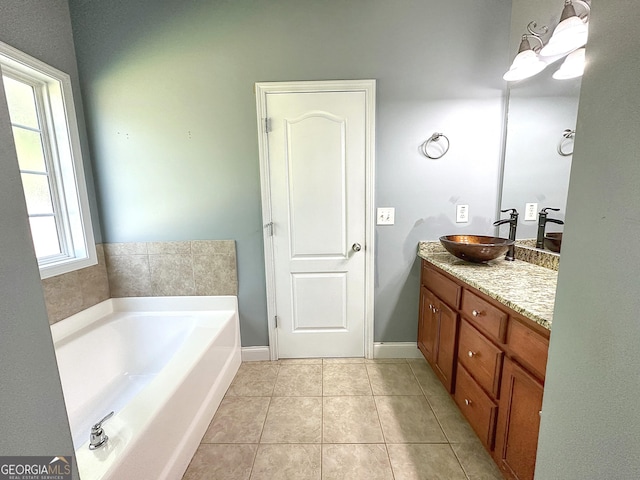 101 Riverchest Dr, Lagrange, GA 30240 - bathroom with vanity, tile patterned flooring, and a garden tub