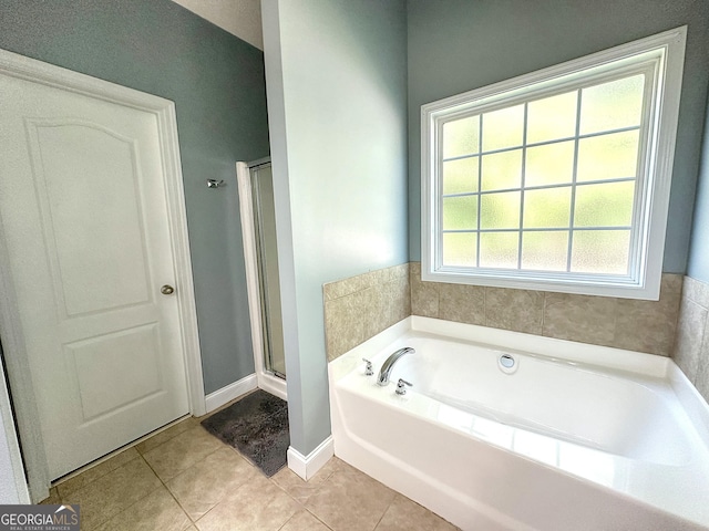 101 Riverchest Dr, Lagrange, GA 30240 - full bathroom featuring tile patterned flooring, a garden tub, and a stall shower