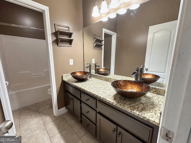 101 Riverchest Dr, Lagrange, GA 30240 - full bath featuring double vanity, tile patterned flooring, and  shower combination