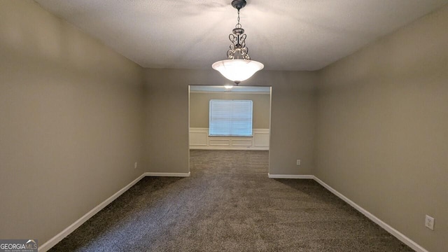 705 Mustang Ct, Hampton, GA 30228 - unfurnished room with dark carpet and baseboards